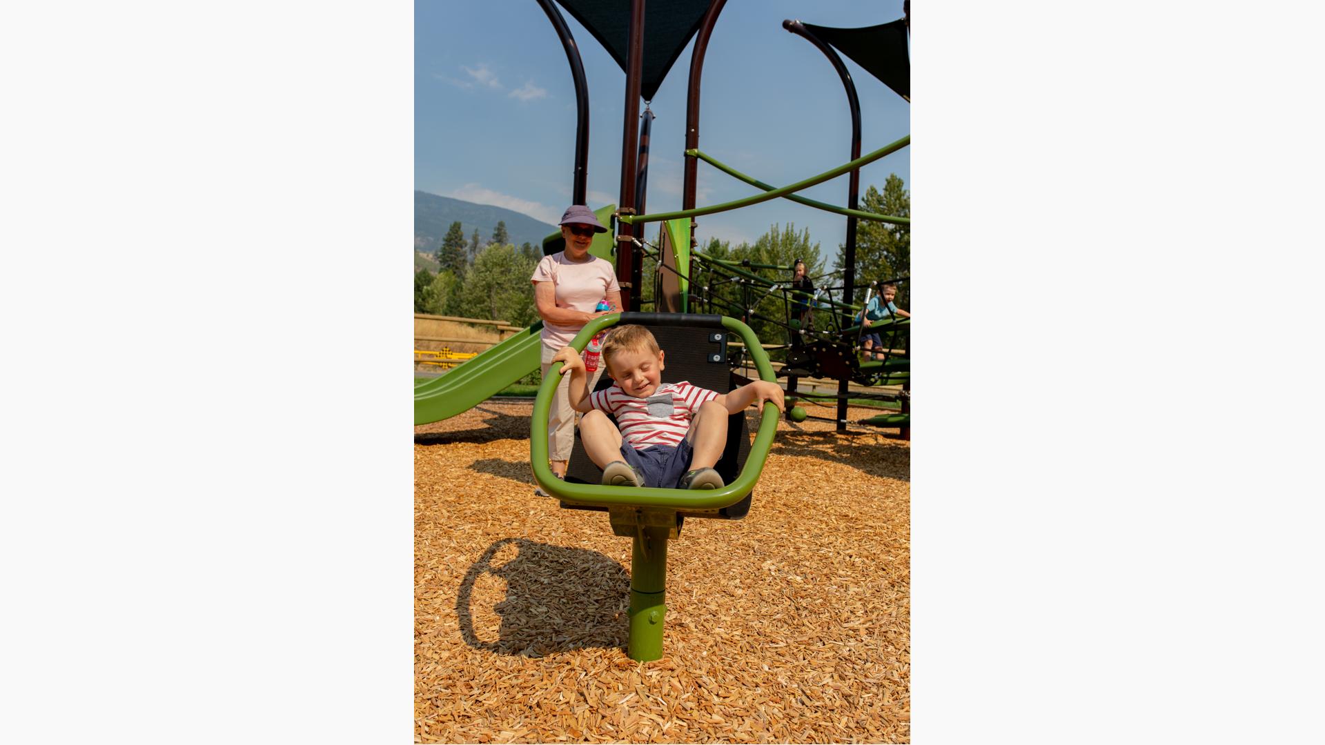 Boy playing on ChillÂ® Spinner